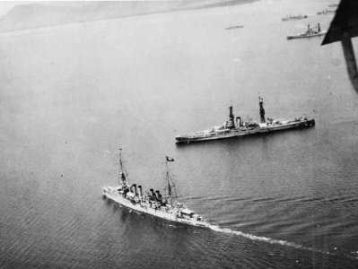 USS Trenton (CL-11) passes USS Arizona (BB-39) off Haiti c1925