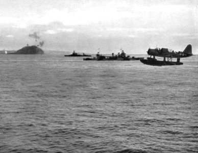 USS Tuscaloosa (CA-37) and USS Arkansas (BB-33) bombarding Iwo Jima on 17 February 1945
