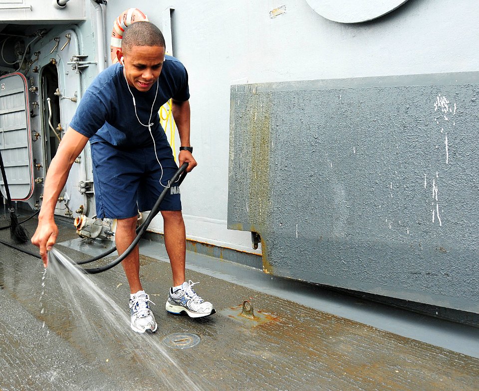 USS Underwood sailor sprays down ship floor 120525-N-ZE938-115