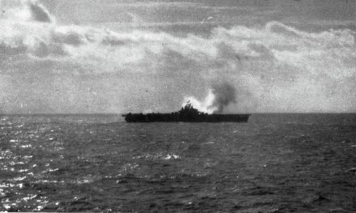 USS Wasp (CV-18) is hit by a Japanese 250kg bomb off Japan on 19 March 1945