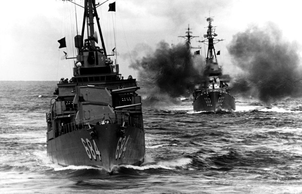 USS Wedderburn (DD-684) and USS Porterfield (DD-682) underway during gunnery practice on 21 August 1964 (USN 1107281)