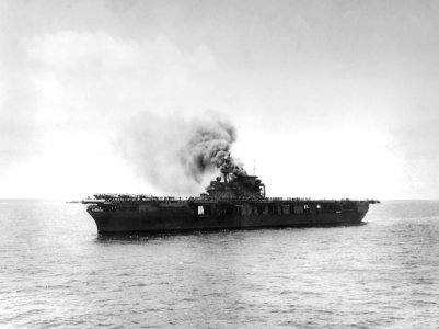 USS Yorktown (CV-5) burning after first Japanese attack at Midway 1942