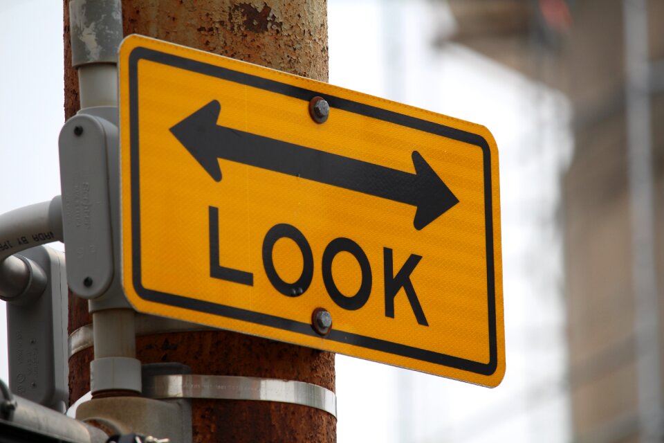 Look sign brown road