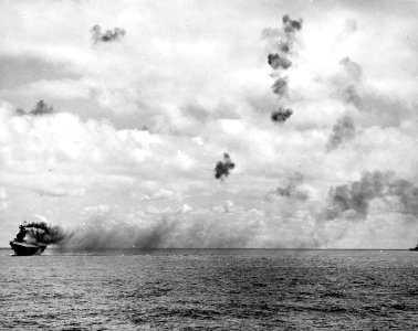 USS Yorktown (CV-5) burning and listing on 4 June 1942