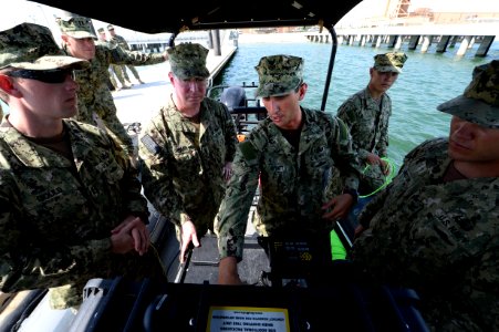 VADM John Miller views CTF 56 assets. 130828-N-DY265-117