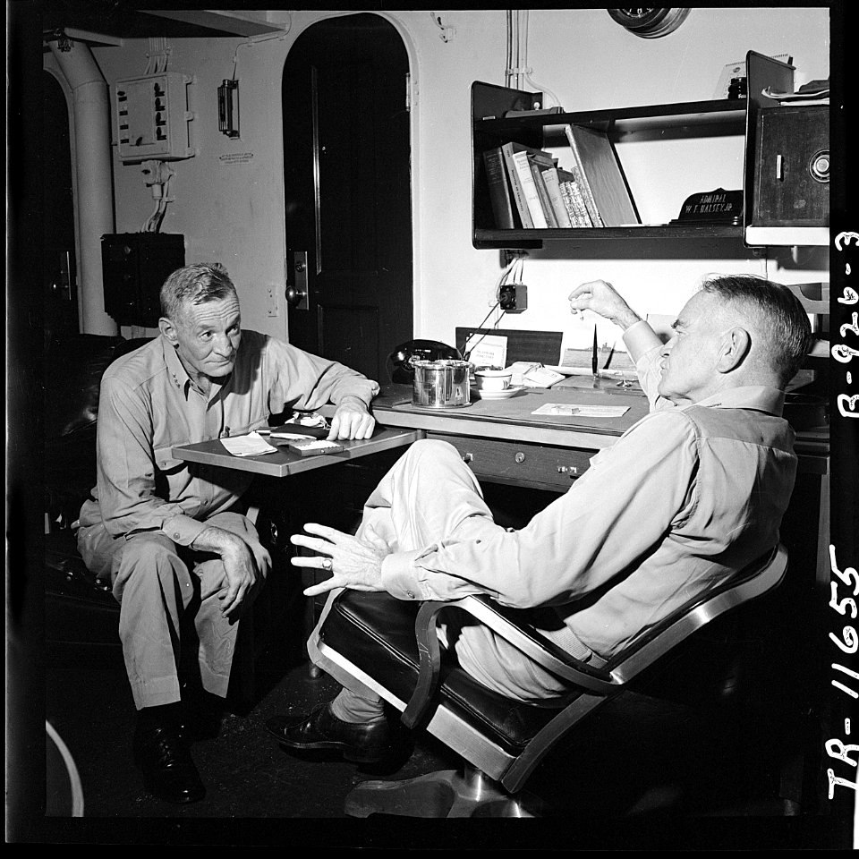 Vadm. John S. McCain (left) and Adm. William F. Halsey, Com. 3rd Flt., hold conference on board USS New Jersey... - NARA - 520890