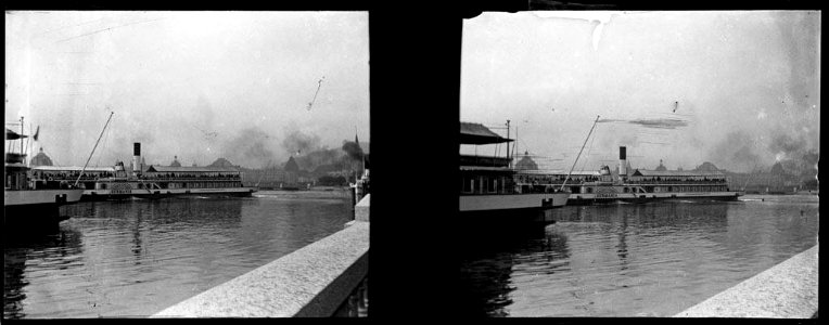 Vaixells al llac de Zuric i al fons alguns edificis