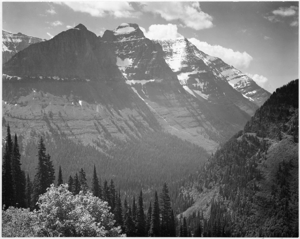 Valley, snow covered mountains in background, In Glacier National Park, Montana., 1933 - 1942 - NARA - 519857
