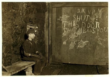Vance, a Trapper Boy, 15 years old. Has trapped for several years in a West Va. Coal mine. $.75 a day for 10 hours work. All he does is to open and shut this door- most of the time he sits LOC cph.3a21704