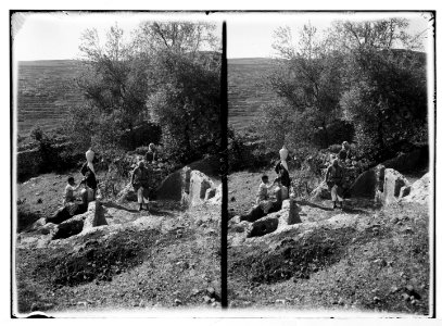 Various subjects of archaeological interest. A Canaanitish winepress at Ain Karem. Natives with middle bronze jars. LOC matpc.03012