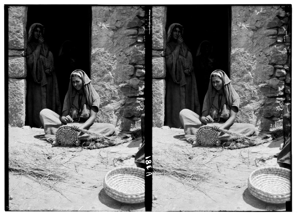 Various types, etc. Woman making straw basket. LOC matpc.05309