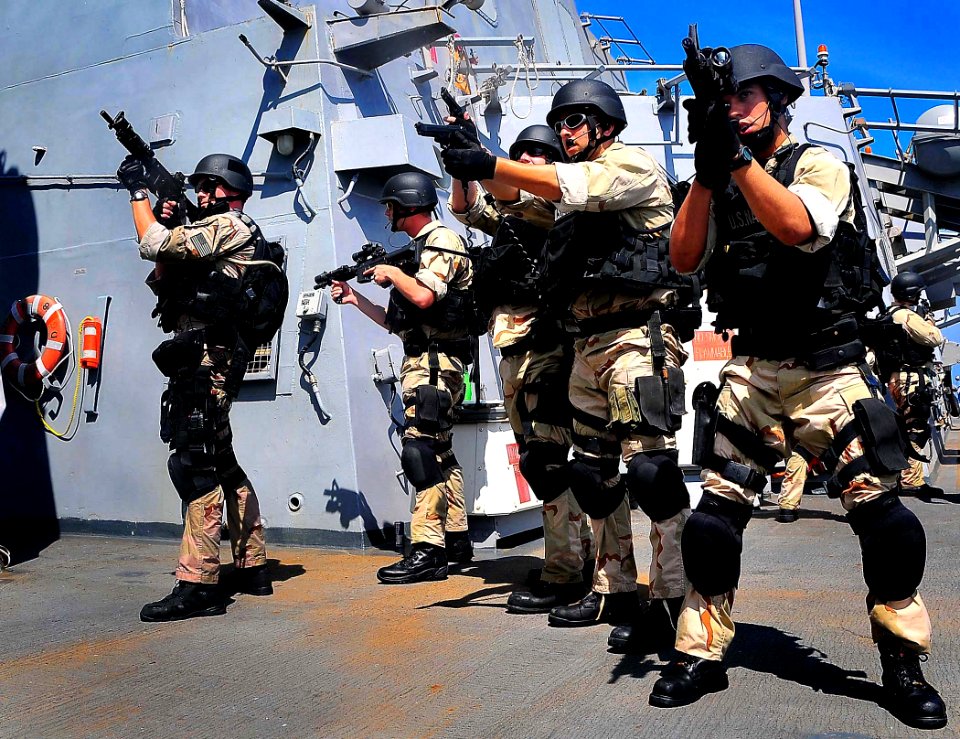 VBSS team from CG 57 maintain weapons-ready surveillance