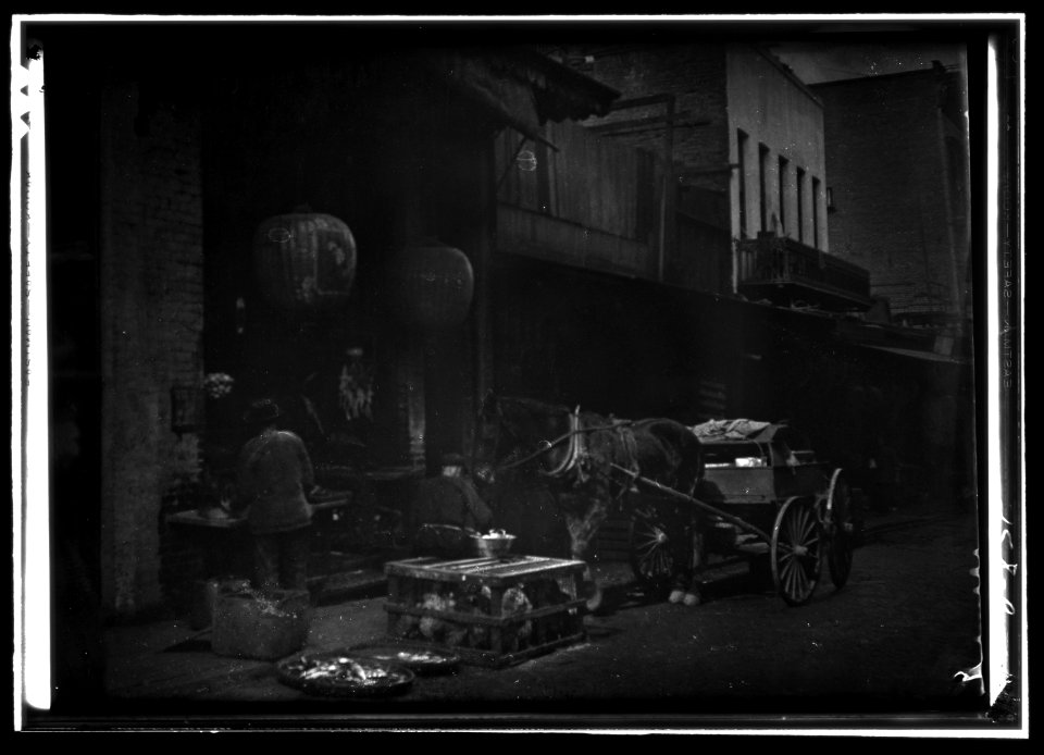 Vendors and a horse and cart on a street, Chinatown, San Francisco LOC agc.7a55050