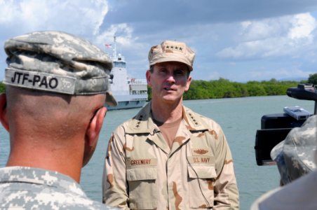 Vice Chief of Naval Operations Adm. Jonathan W. Greenert is interviewed by a Joint Task Force Public Affairs official DVIDS362972 photo