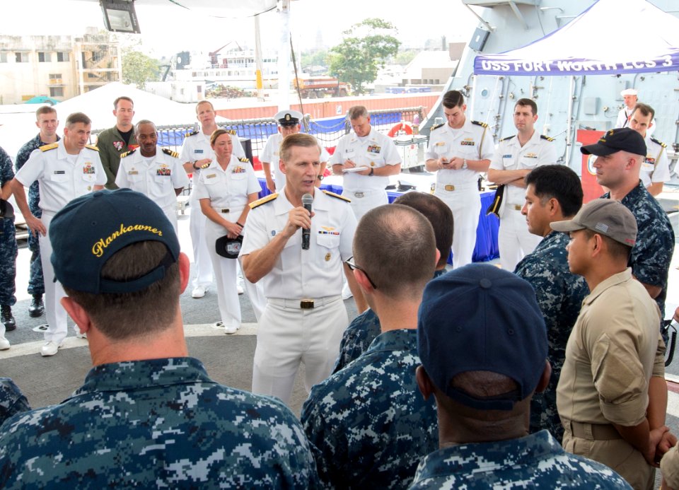 Vice Adm. Joseph Aucoin speaks to Crew 102, assigned to the USS Fort Worth, as part of an All Hands Call