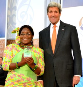 Vicky Ntetema of Tanzania and U.S. Secretary of State John Kerry - IWOC 2016 photo