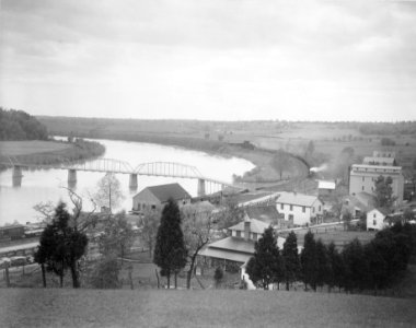 View from hillside of Old Scott's Ferry, Scottsville, Virginia, showing train approaching railroad bridge LCCN95501329