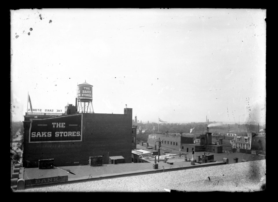 View looking South to Southwest probably from Jenifer Building, (7th & D, N.W.), towards Center Market, Mall, Castle, Printing & Engraving, and showing the Saks stores, Kanns building, and LCCN2016646877