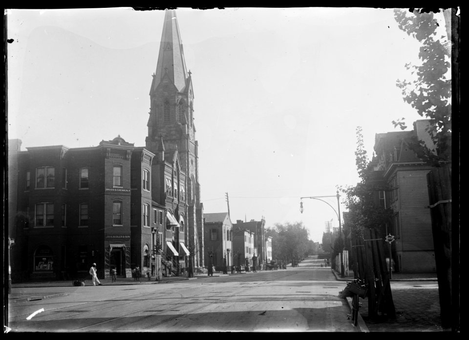 View of 5th Street, N.W., mostly East side, looking South from H Street showing St. Mary's Catholic Church towering over surrounding buildings LCCN2016646872