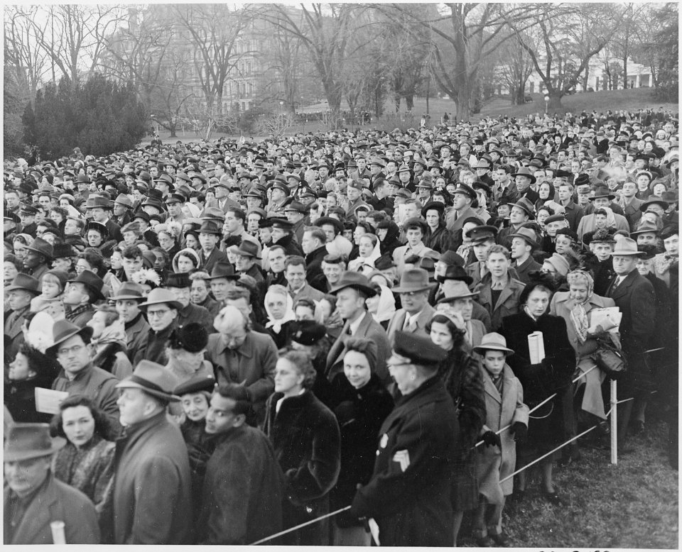 View of crowd at ceremonies for the lighting of the White House Christmas tree. - NARA - 199654 photo