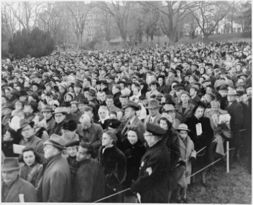 View of crowd at ceremonies for the lighting of the White House Christmas tree. - NARA - 199654