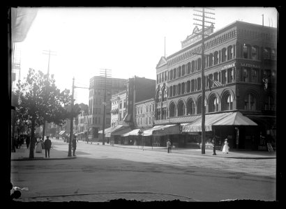 View of G Street, N.W., North side, looking West from 11th Street showing La Fétra's Hotel on the corner along with other shops on the city block LCCN2016646896 photo