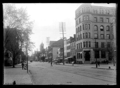 View of G Street, N.W., mostly North side, looking West from 12th Street showing Washington Savings Bank on the corner along with other businesses on the block LCCN2016646890