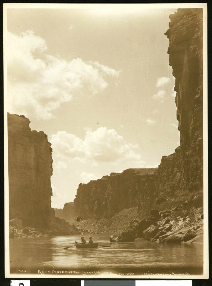 View of Glen Canyon on the Colorado River showing a row boat in the water, ca.1900-1950 (CHS-46517)
