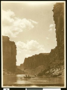 View of Glen Canyon on the Colorado River showing a row boat in the water, ca.1900-1950 (CHS-46517)
