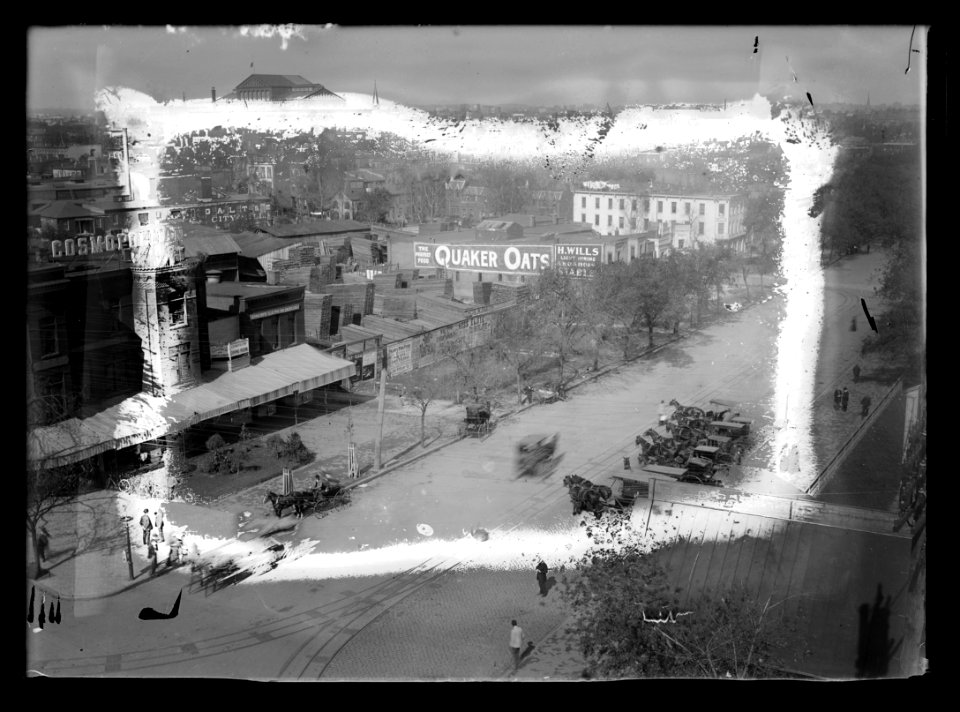 View of N.J. Avenue, N.W., West side, looking North to Northwest from C Street showing Cosmopolitan Hotel on left across from the B & O Railroad station LCCN2016646851