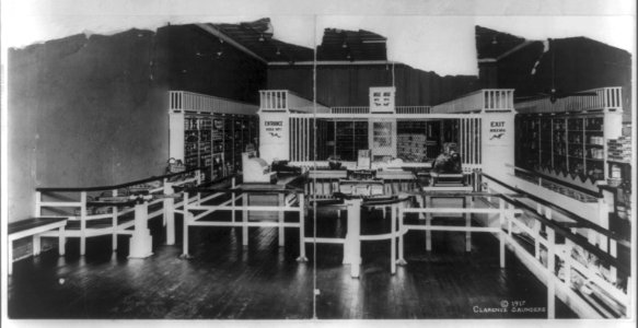 View of interior of Piggly-Wiggly Supermarket looking across lobby and checkout counters. LCCN2017646582