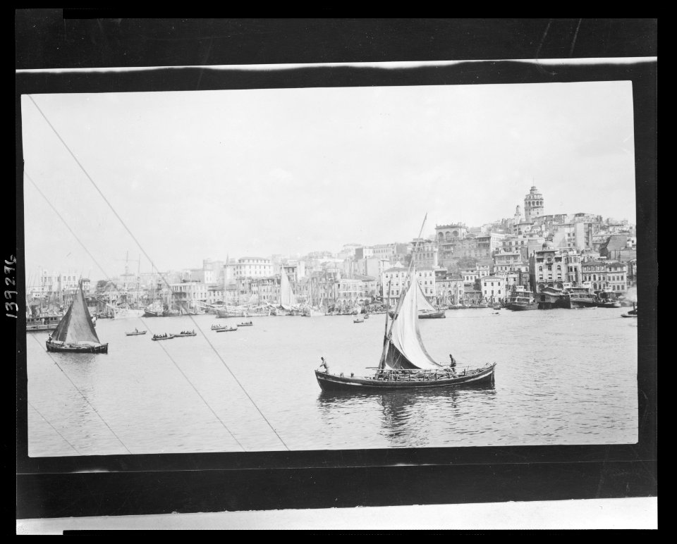 View of Istanbul with sailboats on the water and Galata Tower in the distance LCCN2010650595