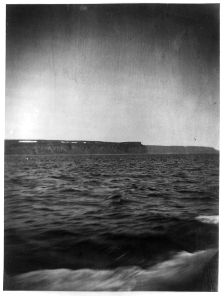 View of land in the Atlantic Ocean, off the coast of Labrador, possibly taken from the schooner Benjamin S. Wright LCCN2012645585