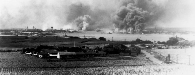 View of Pearl Harbor with burning ships 1941