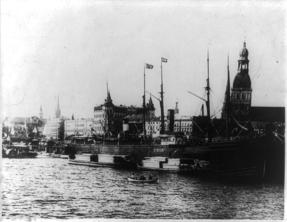 View of Riga, Latvia with waterfront in foregrd; freighter ERIK and lumber barges LCCN2004665467