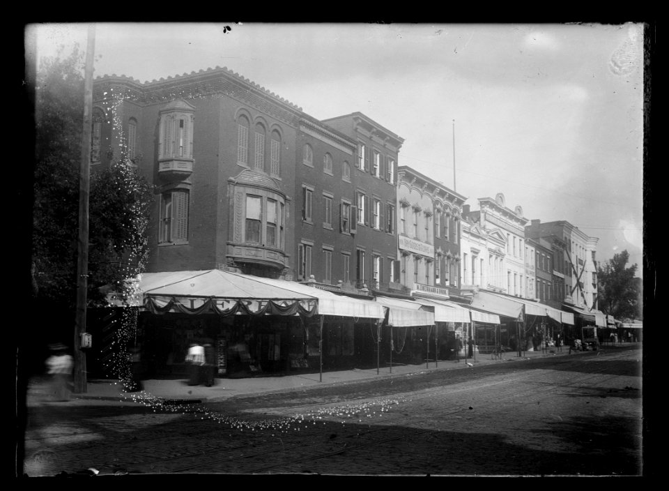 View of stores and shops on 7th Street, N.W., West side, looking North from H Street LCCN2012645919