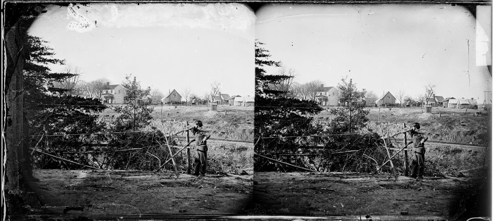 View of town showing farmhouse, outbuildings, etc - NARA - 529586