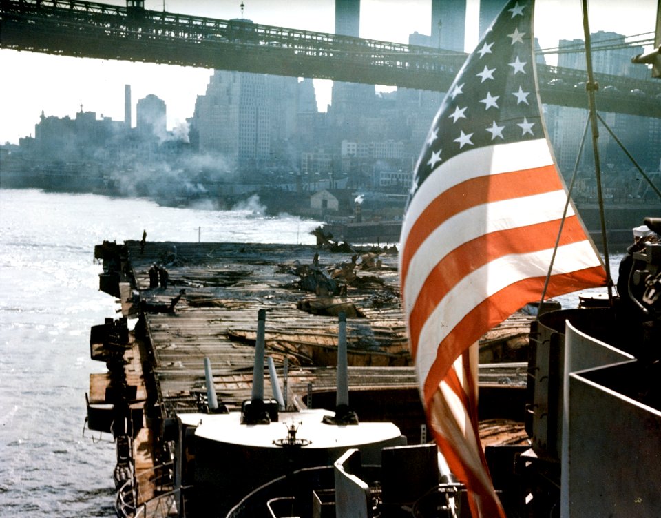 View of the wrecked flight deck aft of USS Franklin (CV-13) off Manhattan in April 1945
