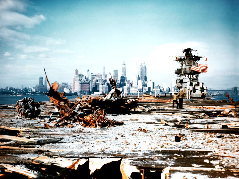 View over the damaged flight deck of USS Franklin (CV-13) off Manhattan on 28 April 1945