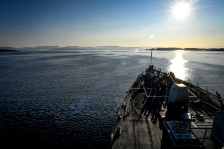 View showing bow of USS Oscar Austin (DDG-79) and sunrise during arrival in Bergen 170827-N-UY653-022