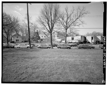 View southwest, streetscape showing 1930 northeast facade and 1968 building