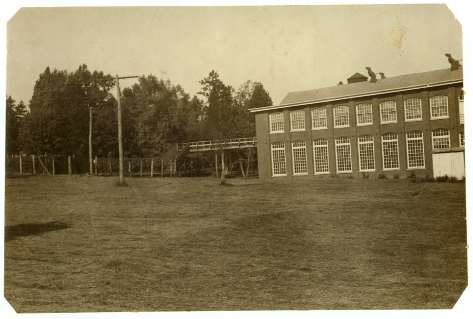 Views of the White Oak Cotton Mills, Greensboro, N.C., showing the beautiful location of the mill, its well-kept grounds, and the good housing conditions. LOC nclc.02678