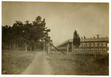 Views of the White Oak Cotton Mills, Greensboro, N.C., showing the beautiful location of the mill, its well-kept grounds and the good housing conditions. LOC nclc.02680