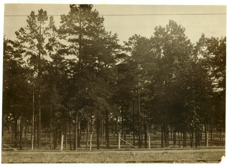 Views of the White Oak Cotton Mills, Greensboro, N.C., showing the beautiful location of the mill, its well-kept grounds, and the good housing conditions. LOC nclc.02679