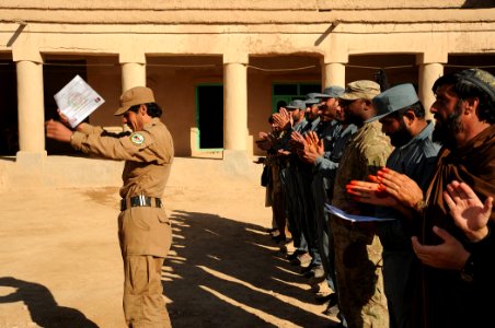Village Veterinary Outreach Program-Afghanistan Local Police student graduation 111202-N-UD522-091