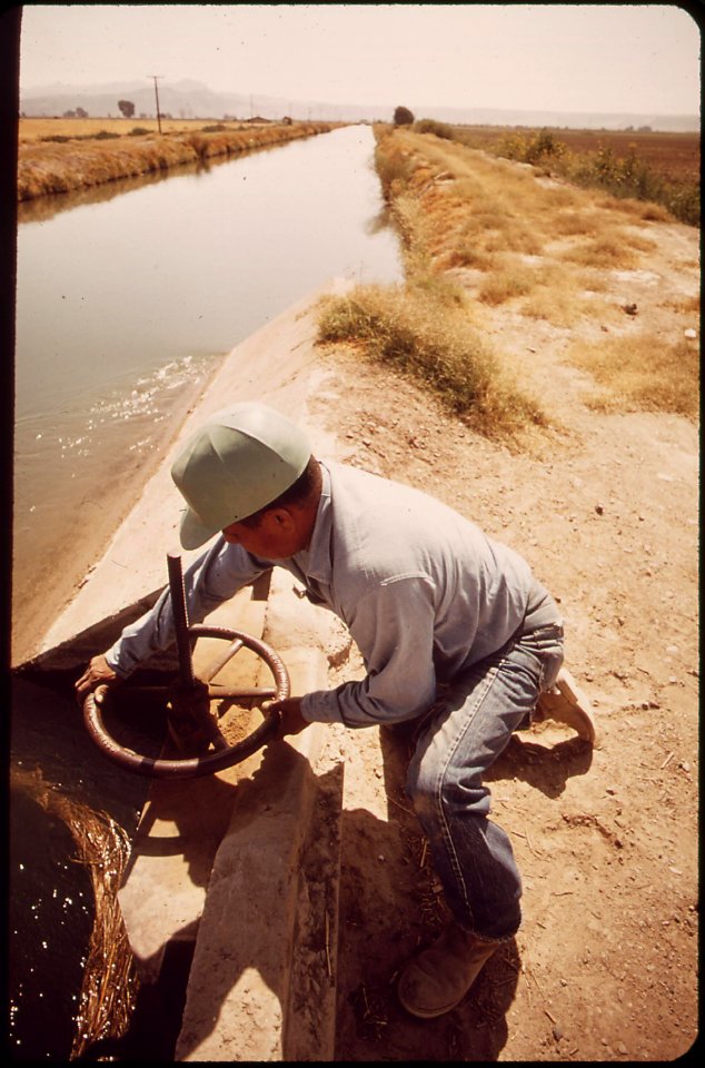 Vincent-humeumptewa-hopi-indian-and-employee-of-the-irrigation-district-opens-canal-gates-near-parker-may-1972 7152704283 o