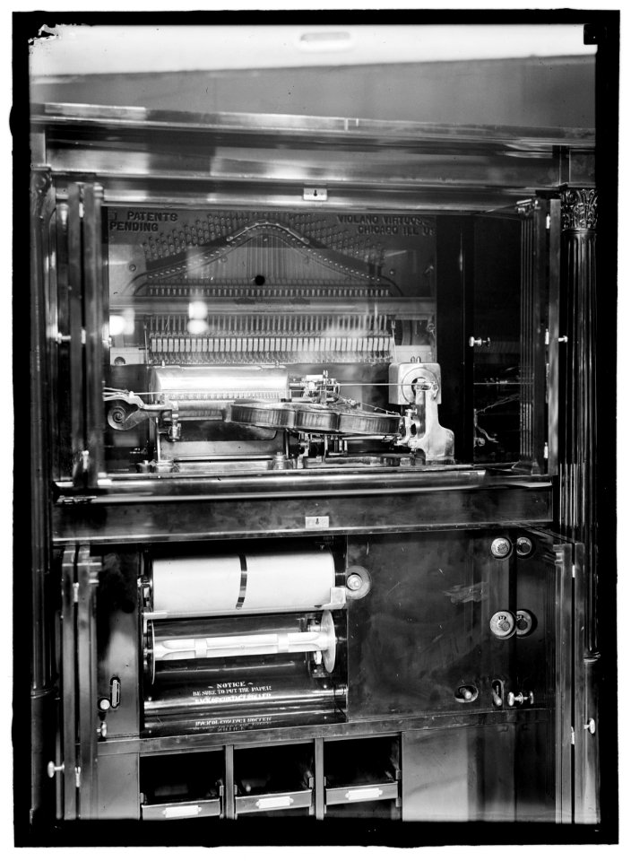 Violano Virtuoso. It had an electric player violin and a player piano. It played music off of rolls LOC hec.04520