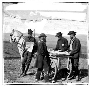 Virginia. Newspaper vendor and cart in camp LOC cwpb.01140