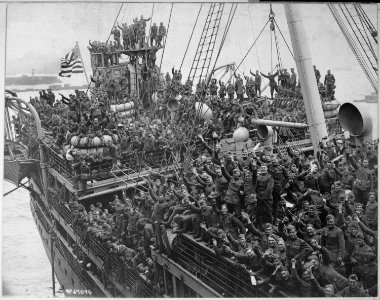 Visitors Day at the Naval Training Station. Boys of the Training Station shown taking their friends and relatives to... - NARA - 533706