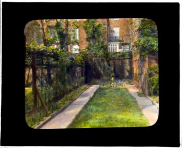 Vivian Spencer townhouse, West 12th Street, New York, New York. Birdbath on lawn LCCN2008675983